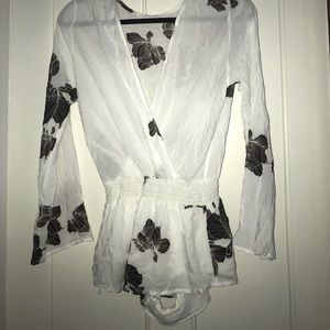 Super cute white and flower romper